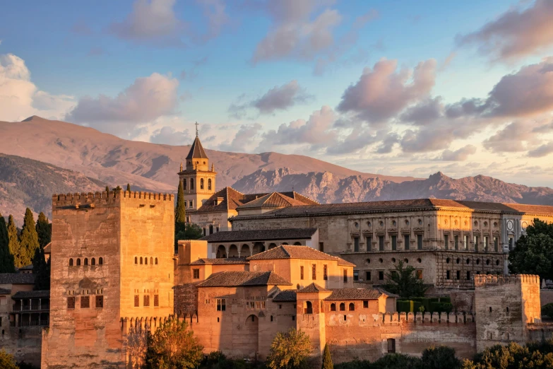 the castle sits near the mountains and is very old