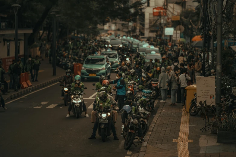 a street with motorcycles parked on both sides of the street