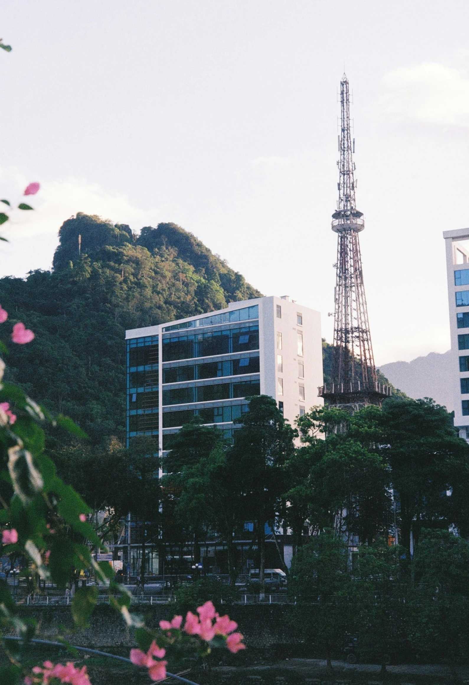 a tall tower in the middle of a city