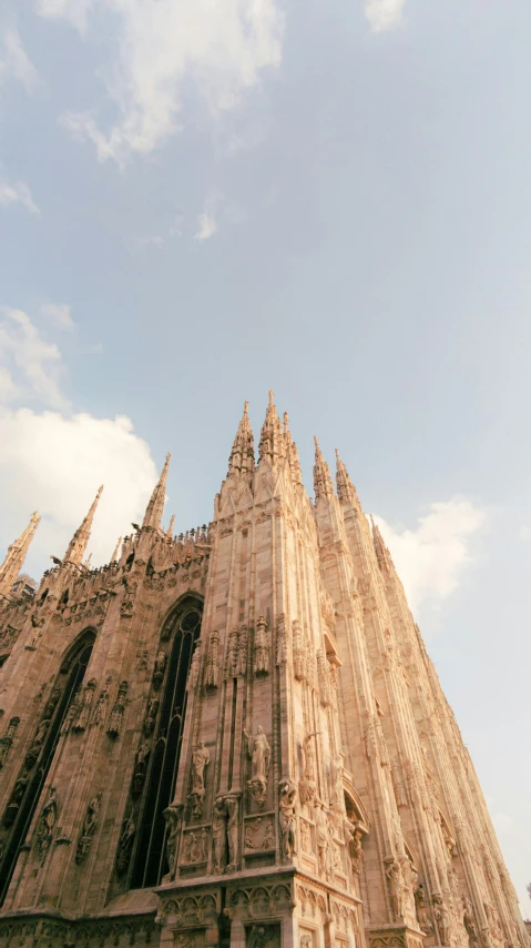 a very tall church building with many windows