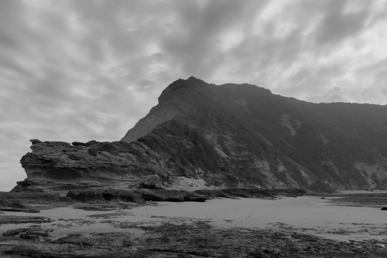 black and white pograph of the rocks at the beach