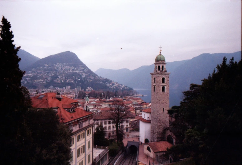 a view of a city from a high hilltop