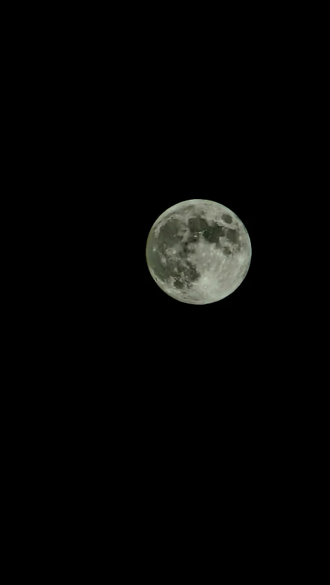 the moon as seen from an airplane in the sky