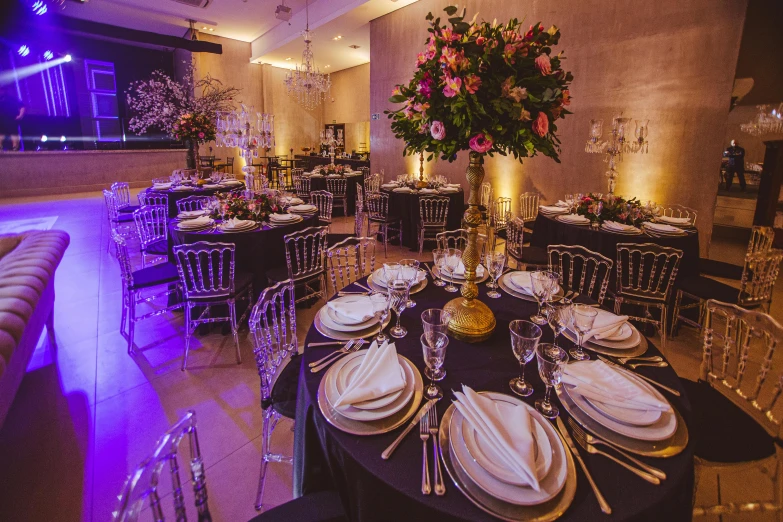 a very large dining room with nice looking tables