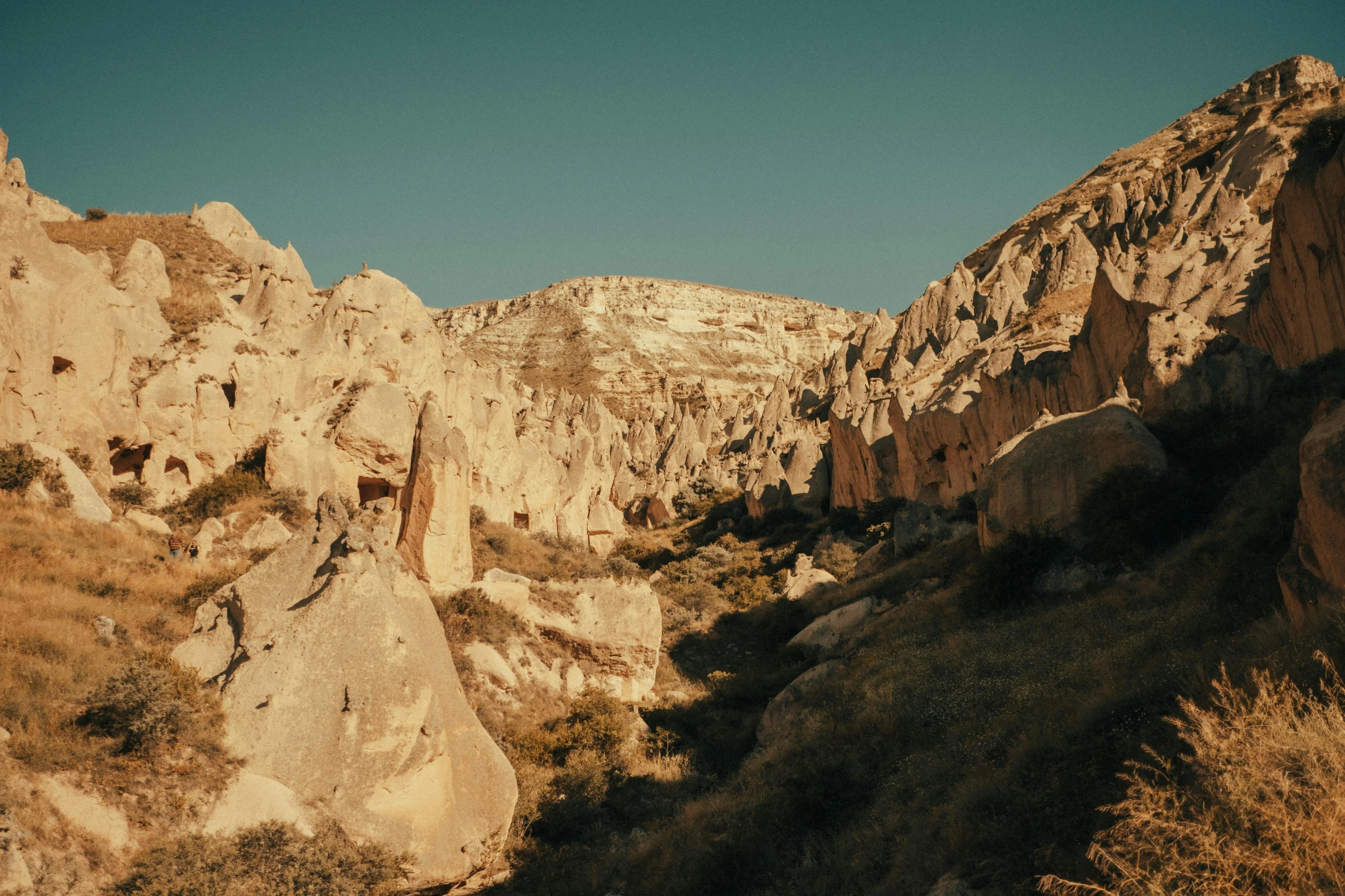 the view from the top of a large rock cliff