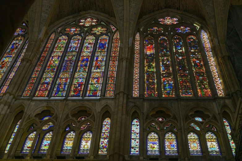 a stained glass window in the interior of a building