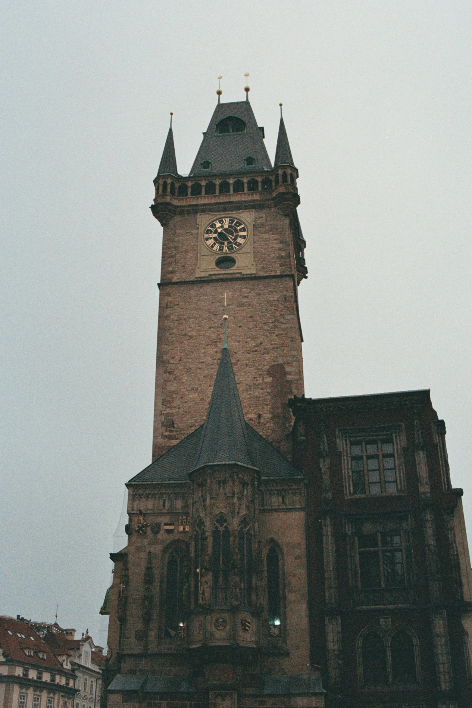 tall brick building with a clock tower on top