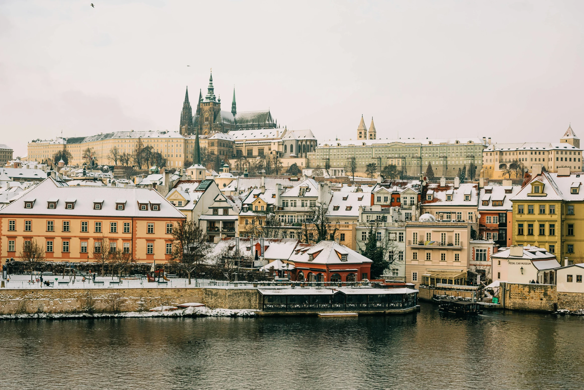 some very pretty buildings by the water in winter