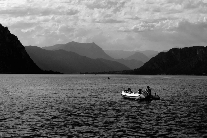 several small boats in a body of water