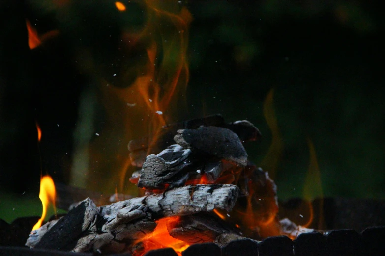 a fire burning in the open flame of a wood