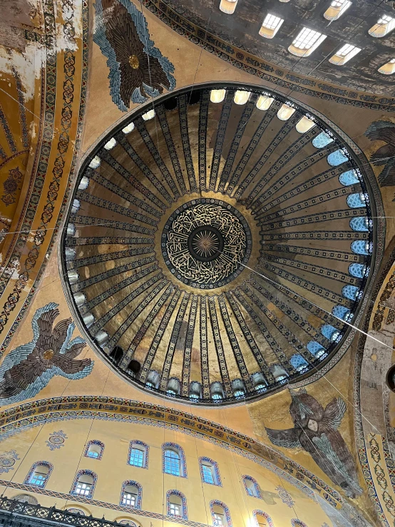 a circular domed ceiling inside a building