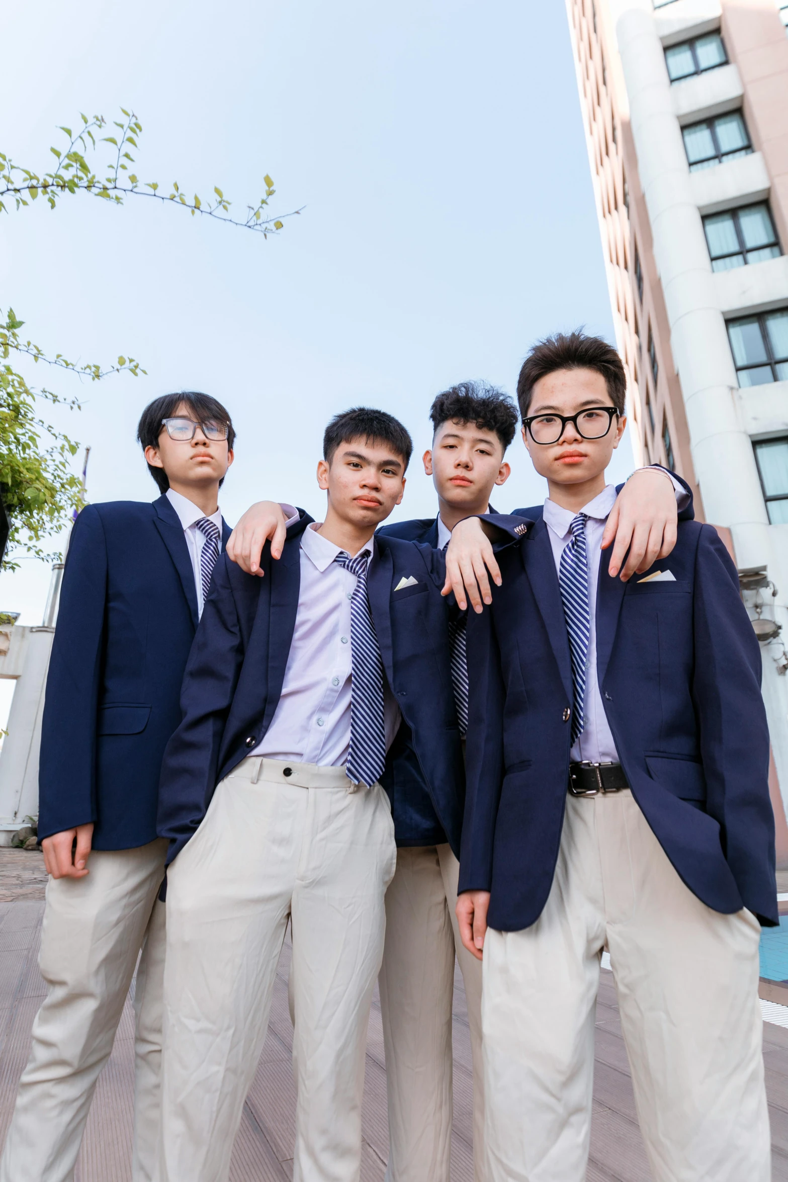 a group of young men standing next to each other