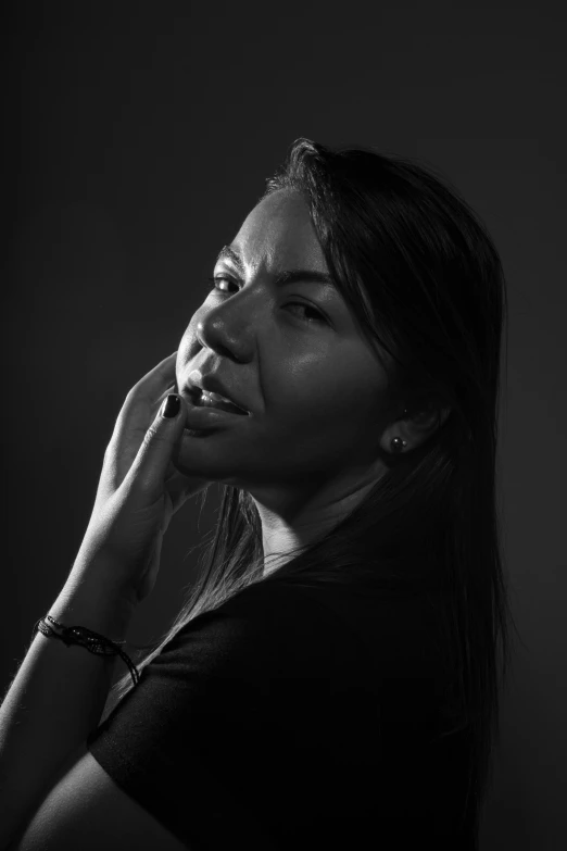 a woman talking on a cell phone with both hands