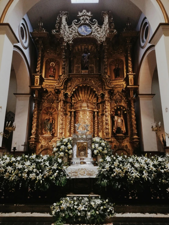 the altar inside an elaborately decorated church