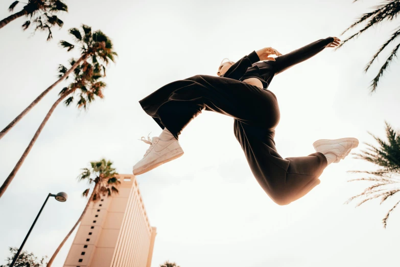 a person is doing tricks in the air with their skateboard