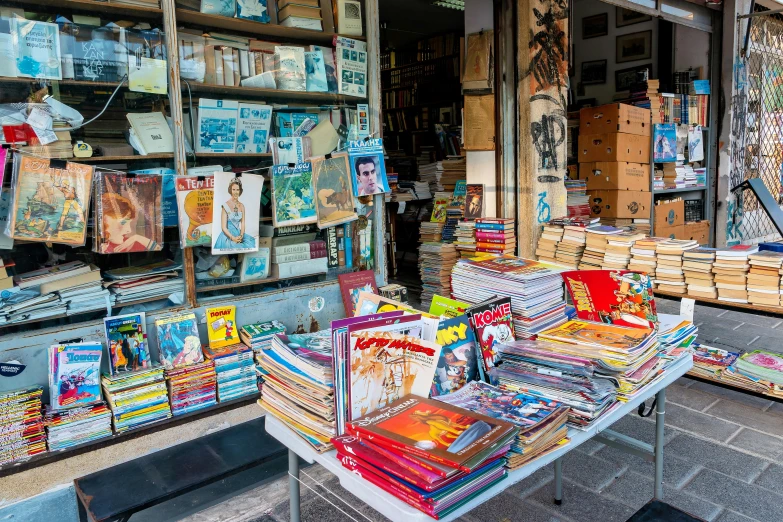 a bookshop with books inside and outside the windows