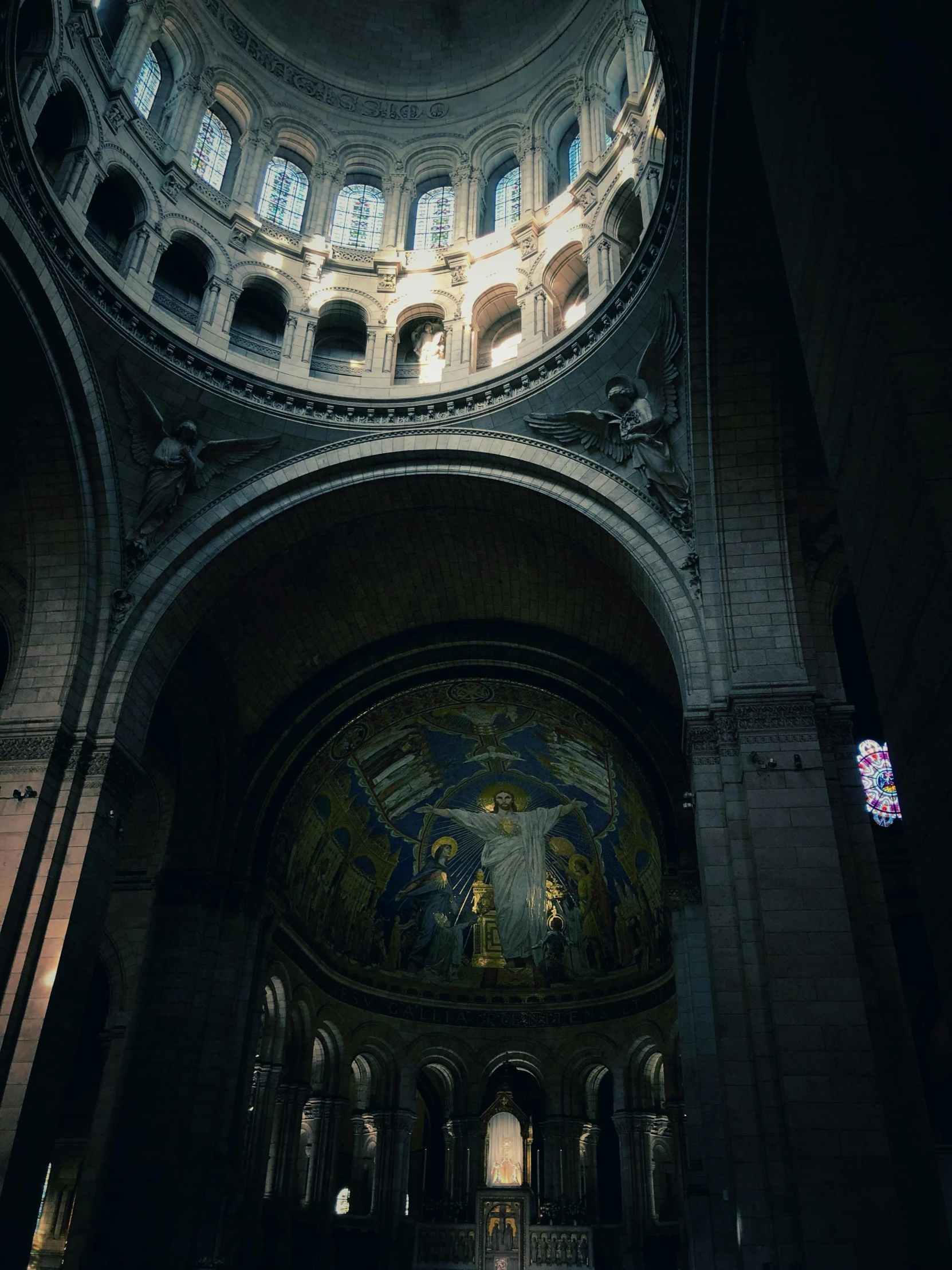 a very large church with lots of windows and arches