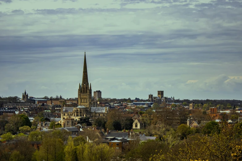 a church spire rising high above a city