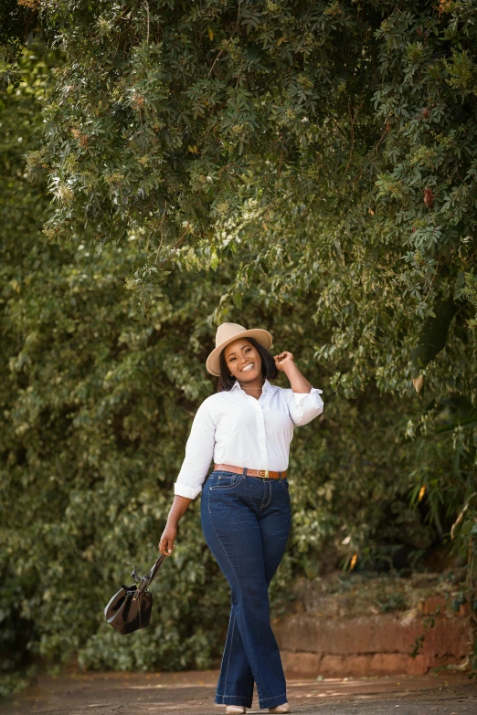 an image of a woman walking in front of trees