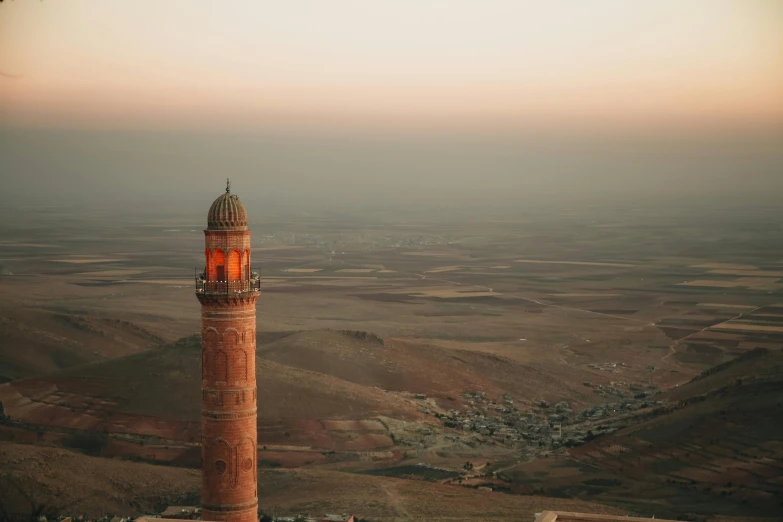 an image of a clock tower high in the air