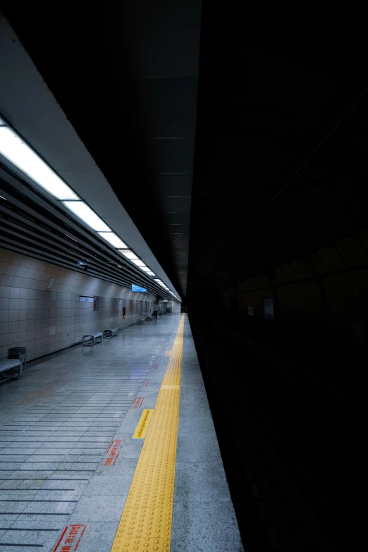 a subway station is seen here at night