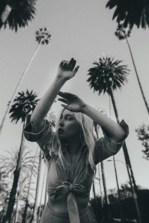 a woman holding an object in her hands