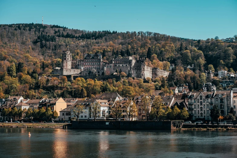 a large mountain side town and the surrounding mountains