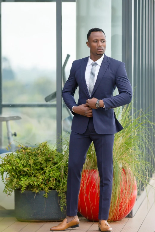 man wearing suit in an office setting