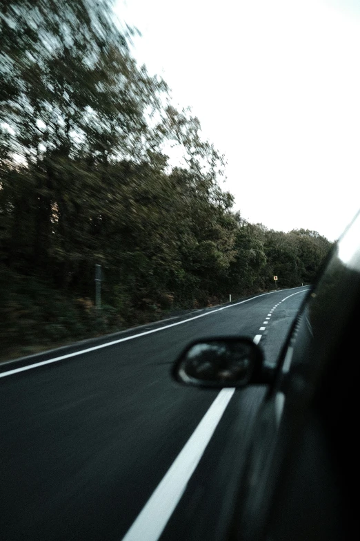 a car that is driving down a road