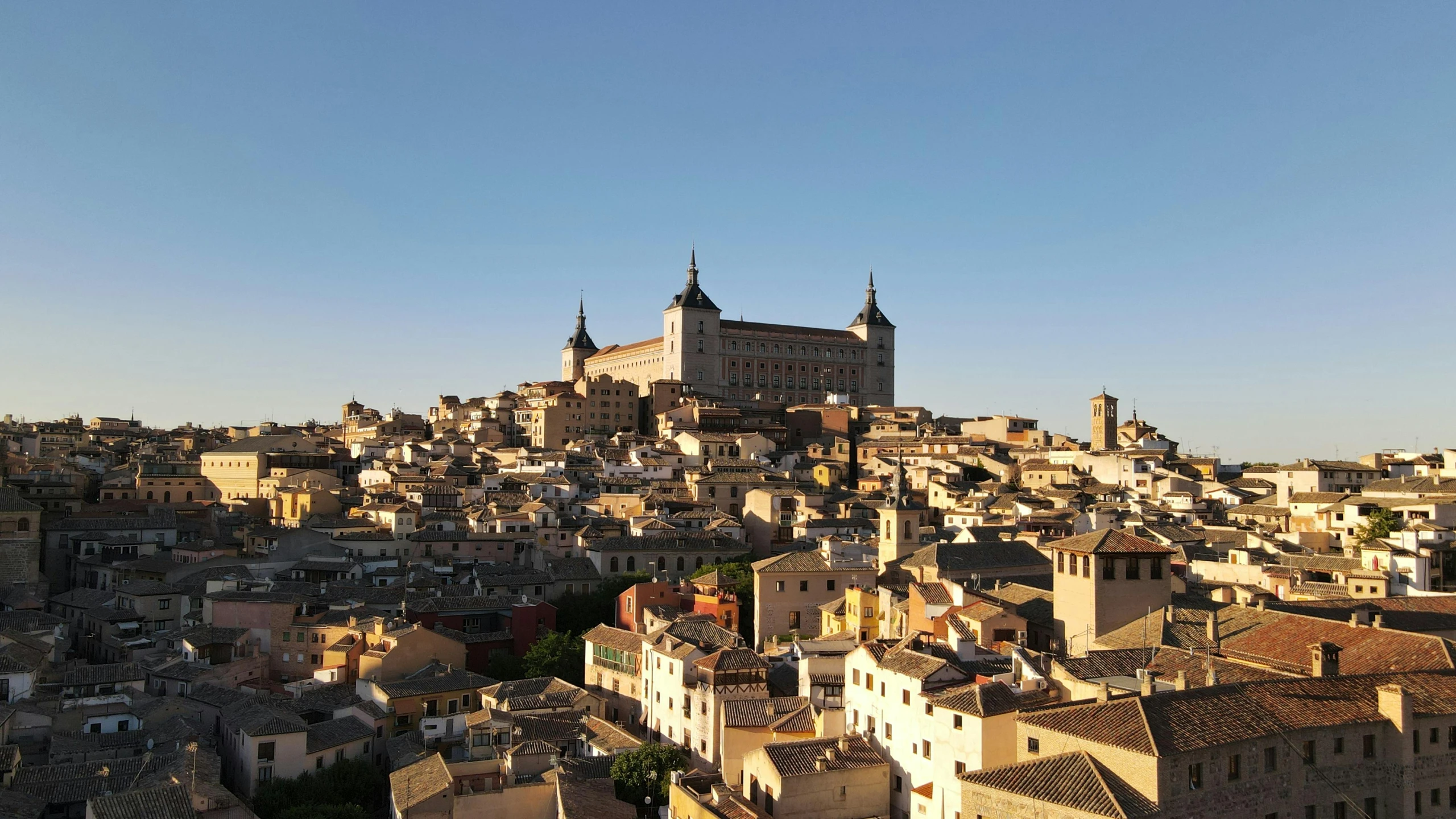 a view of some very old city from the hill