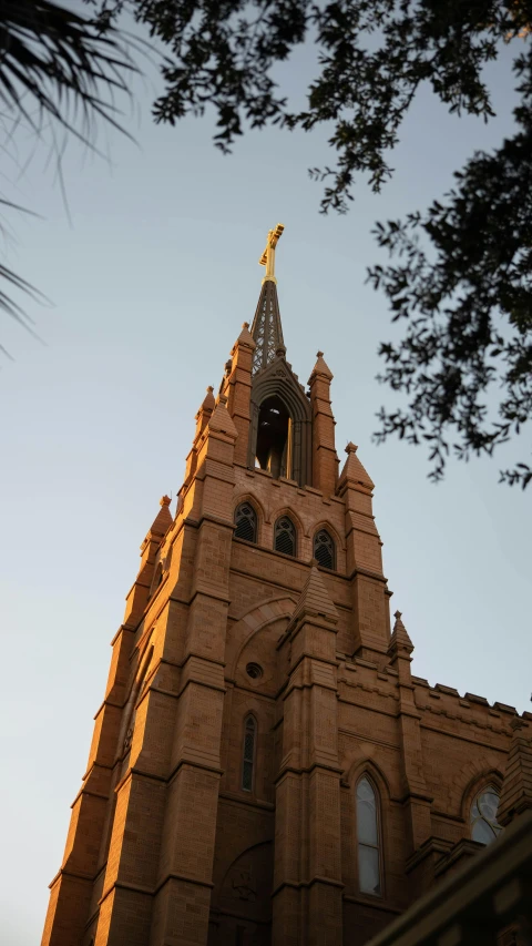 a church clock tower at the top of the steeple