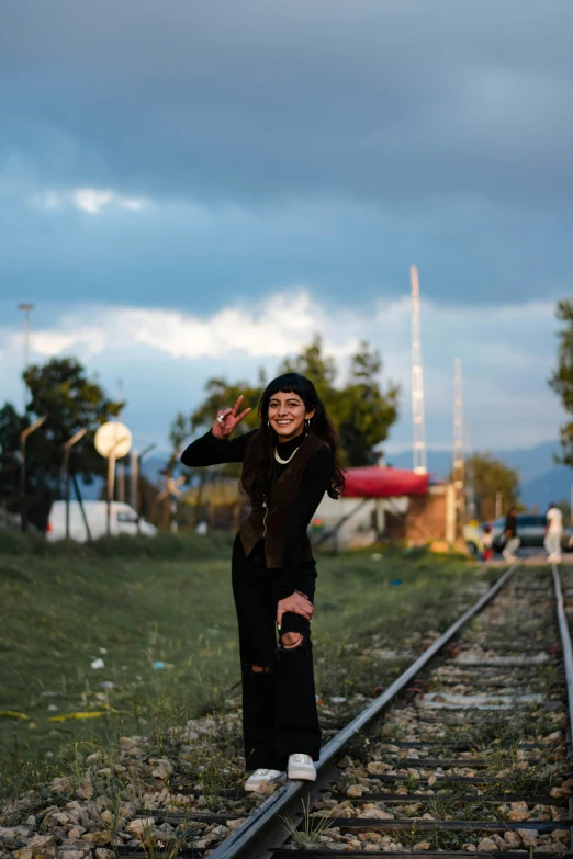 a person with knee ces posing on tracks