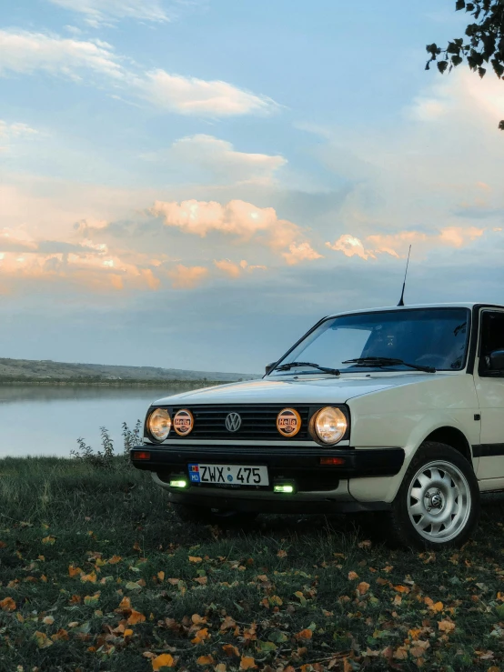 an image of a car parked by the water