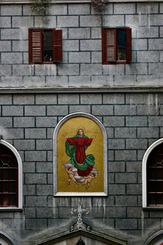 a church building with an interesting window above it