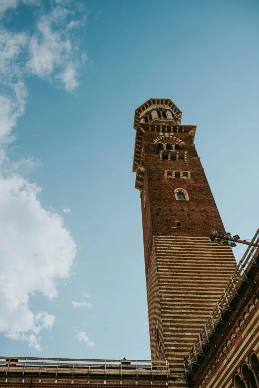 a very tall building with a clock tower on top