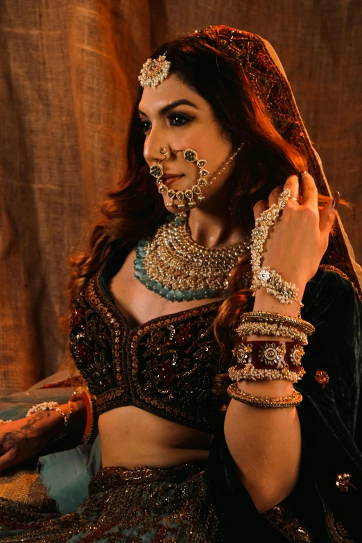 a woman dressed in a bridal gown and matching jewelry