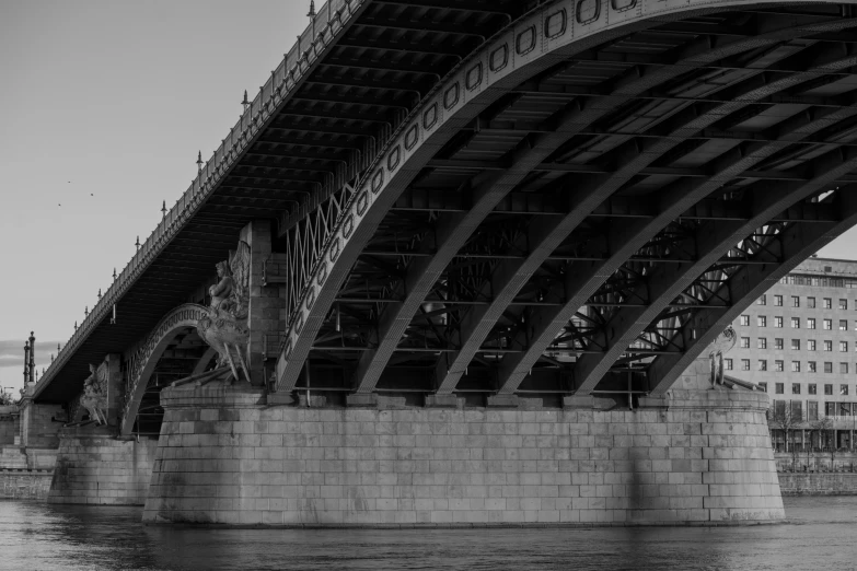 a large bridge spanning over the width of the river