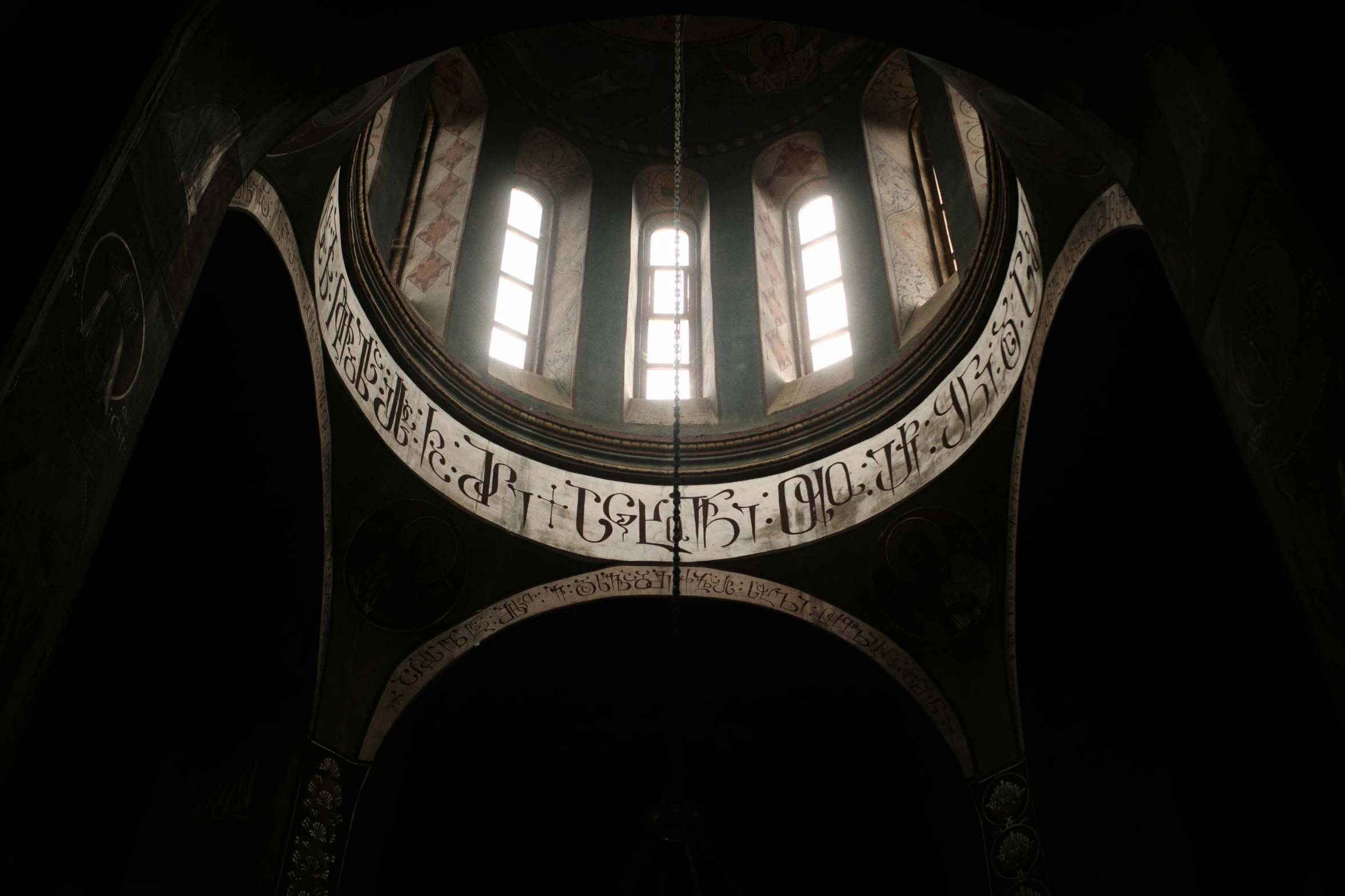 a dome with a black background and some windows