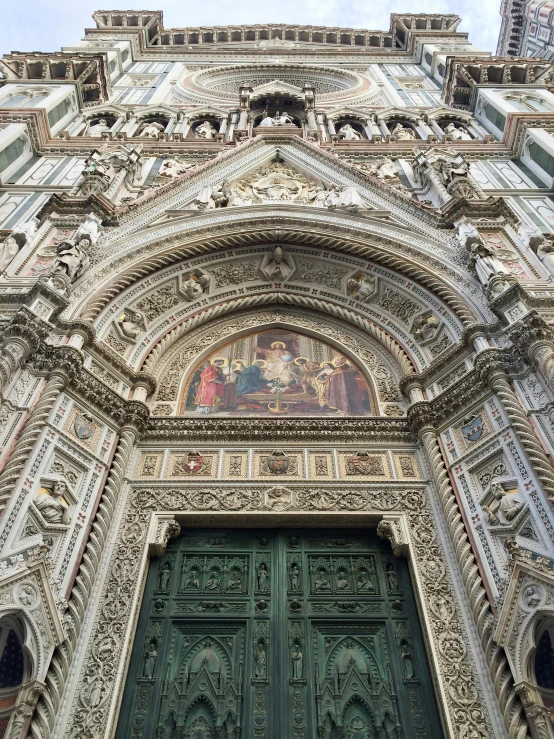 an ornately designed doorway to a gothic structure