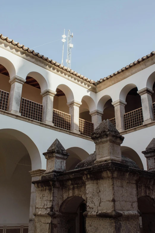 the inside of an old style building with many windows