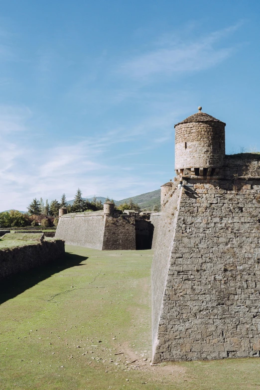 the walls and tower of the defensively built area