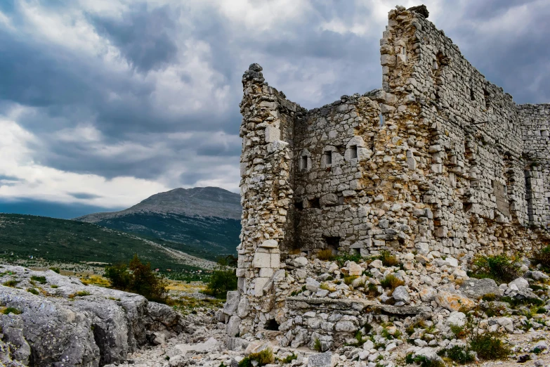 there are rocks and gravel around the old building