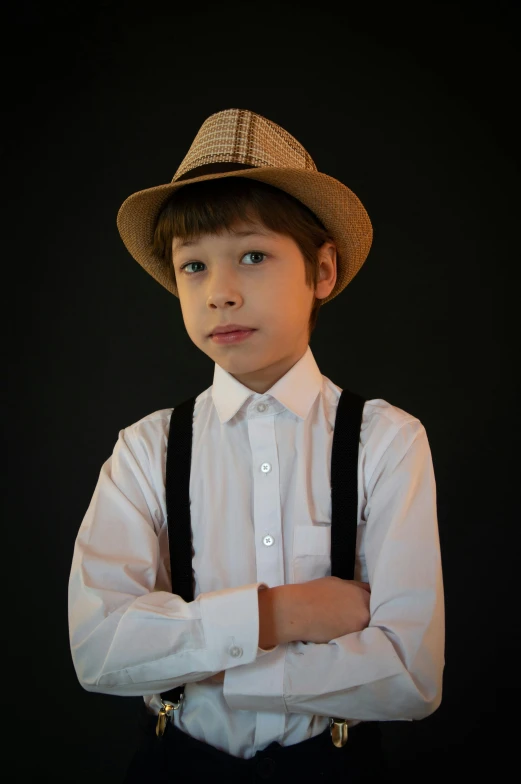 a  wearing a white shirt and hat