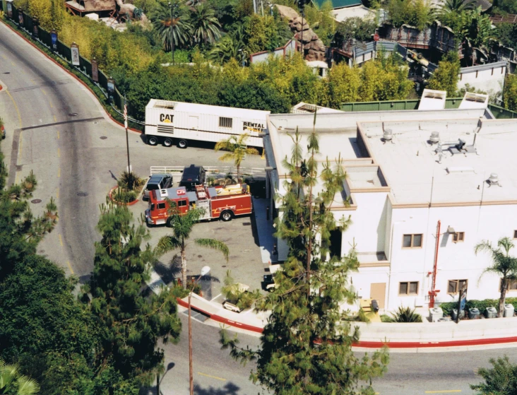 an aerial view of a home and an fire truck