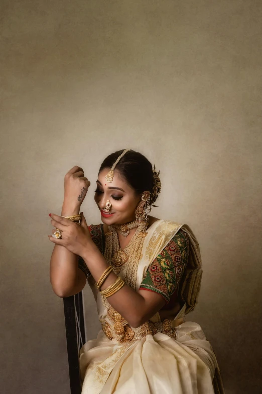 a woman in white dress posing for a po