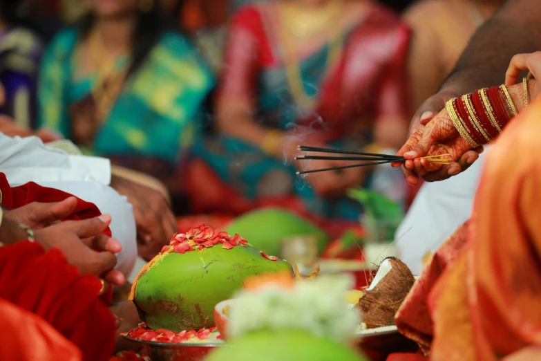 an image of a group of people eating food