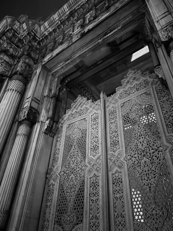 an ornate doorway with intricate carvings on it