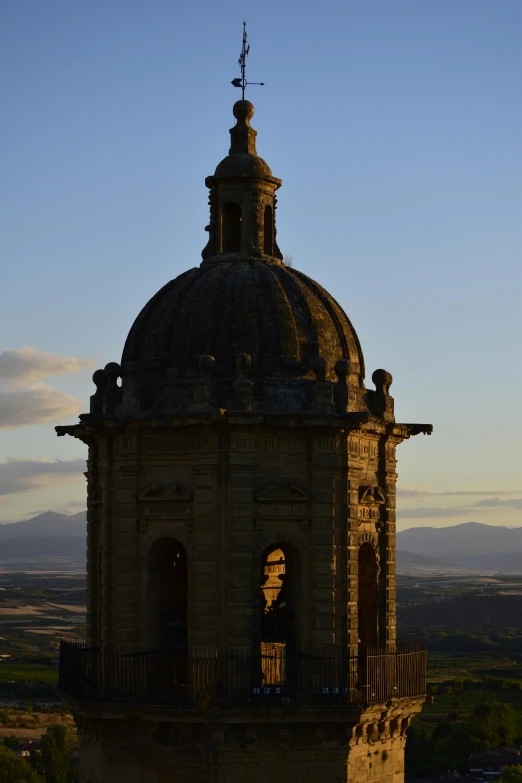 this is a tall building overlooking the mountains