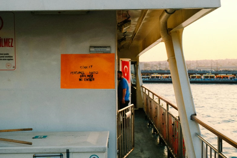 a po taken from a boat as people stand at the railing