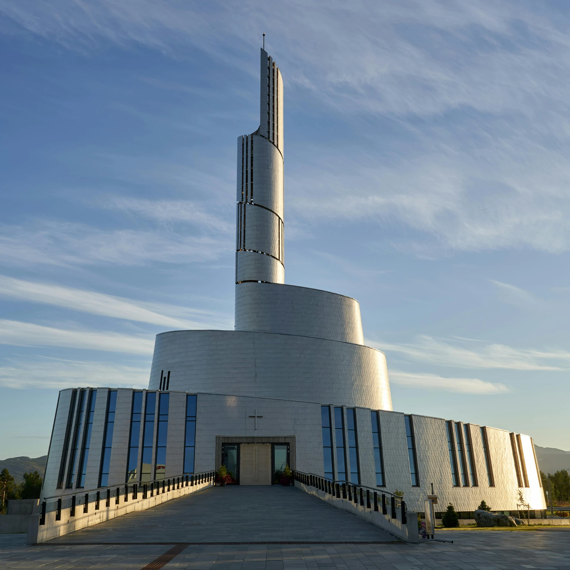 a church with a spire that is shaped like an airplane